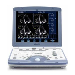The image shows a portable ultrasound machine with a monitor displaying an ultrasound scan of a heart.